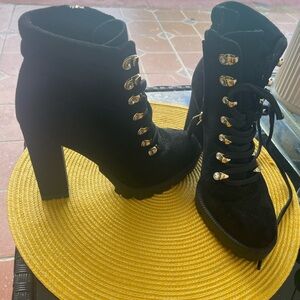 Elegant Black Ankle Boots with Gold Accents